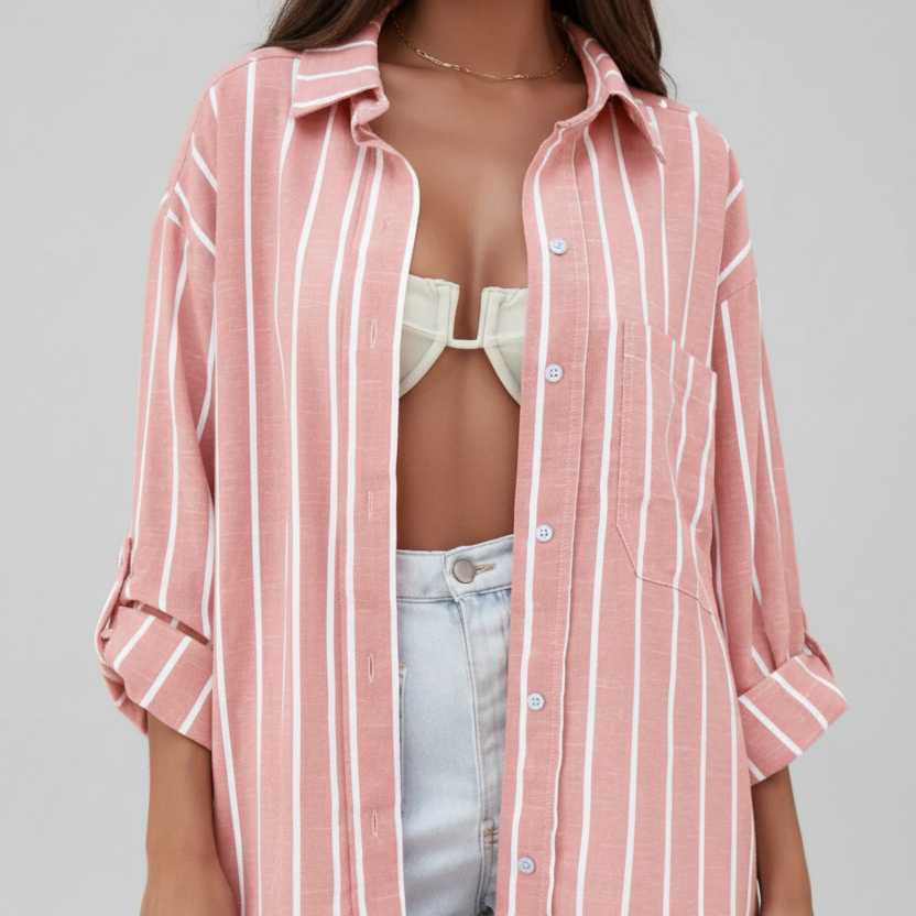 Pink and white vertical striped button-down oversized shirt with point collar, chest pocket, and long roll-tab sleeves | The Pretty Pistol