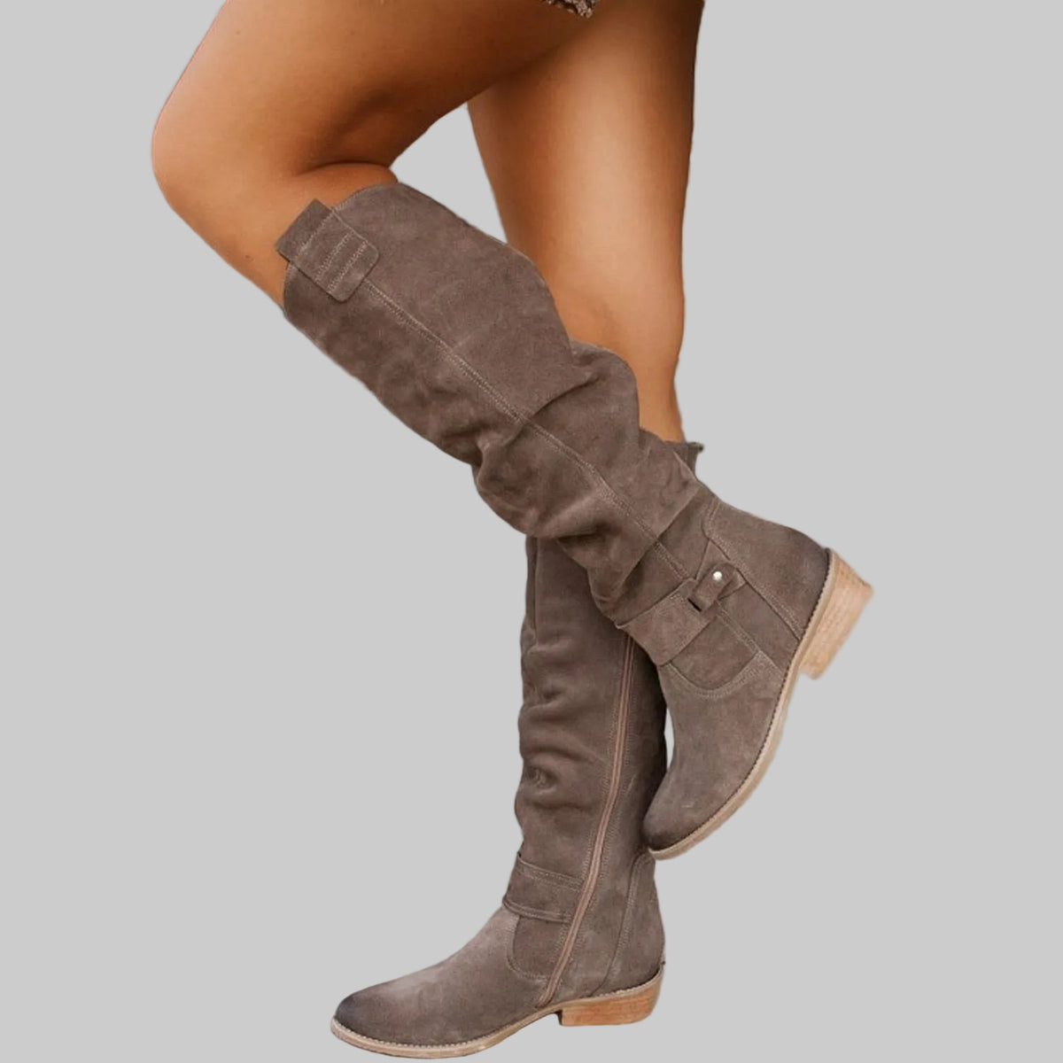 Brown taupe slouchy suede knee-high boots with buckle detail and low heel, street style look | The Pretty Pistol
