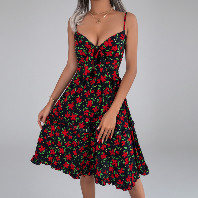 Black chiffon spaghetti strap midi dress with allover red floral print, sweetheart neckline with knotted bow tie, fitted bodice, and flowy A-line skirt with ruffled hem | The Pretty Pistol