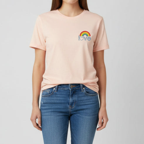 Black cotton crew neck t-shirt with small rainbow arc and "love" left chest graphic in blue outline lettering, styled flat lay with distressed denim shorts and white Converse sneakers | The Pretty Pistol