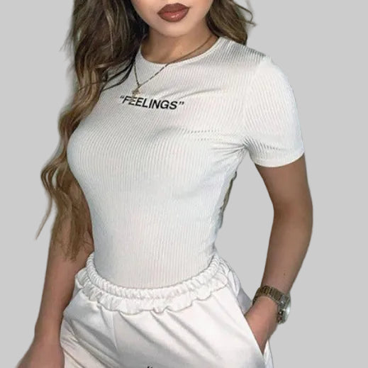 Women’s Feelings White Ribbed Short-Sleeve Bodysuit in White – FEELINGS Lettering, Round Neck, Sizes S–L | The Pretty Pistol