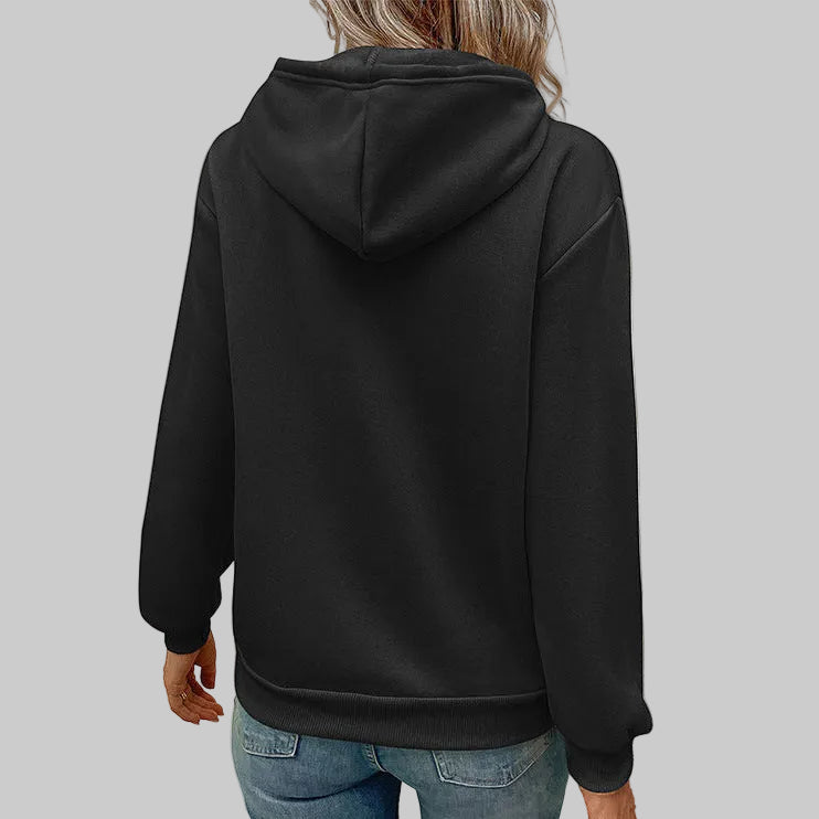 Back view of black women's pullover hoodie showing hood construction and relaxed oversized fit | The Pretty Pistol