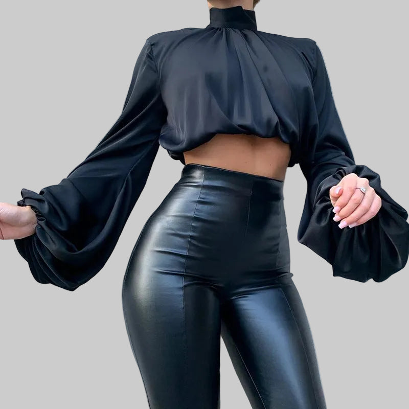 Black satin lantern sleeve crop blouse showing gathered mock neckline and oversized puff sleeve detail | The Pretty Pistol