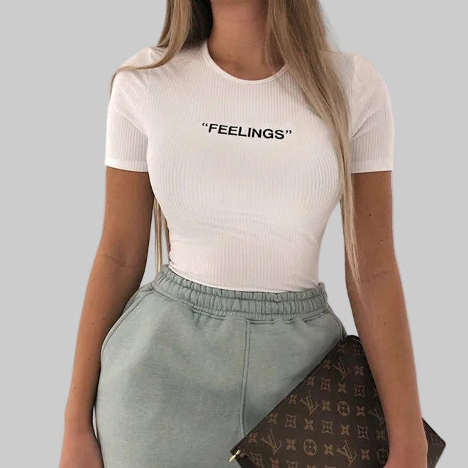 Women’s Feelings White Ribbed Short-Sleeve Bodysuit in White – FEELINGS Lettering, Round Neck, Sizes S–L | The Pretty Pistol
