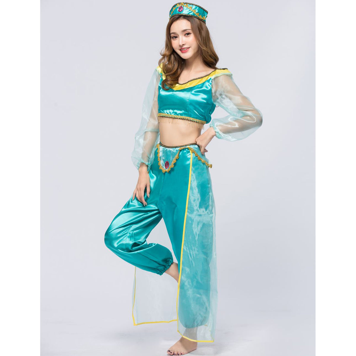 Princess Jasmine costume set in teal satin with off-shoulder crop top, sheer sleeves, gold trim, harem pants, tassel belt, and jeweled headpiece | The Pretty Pistol
