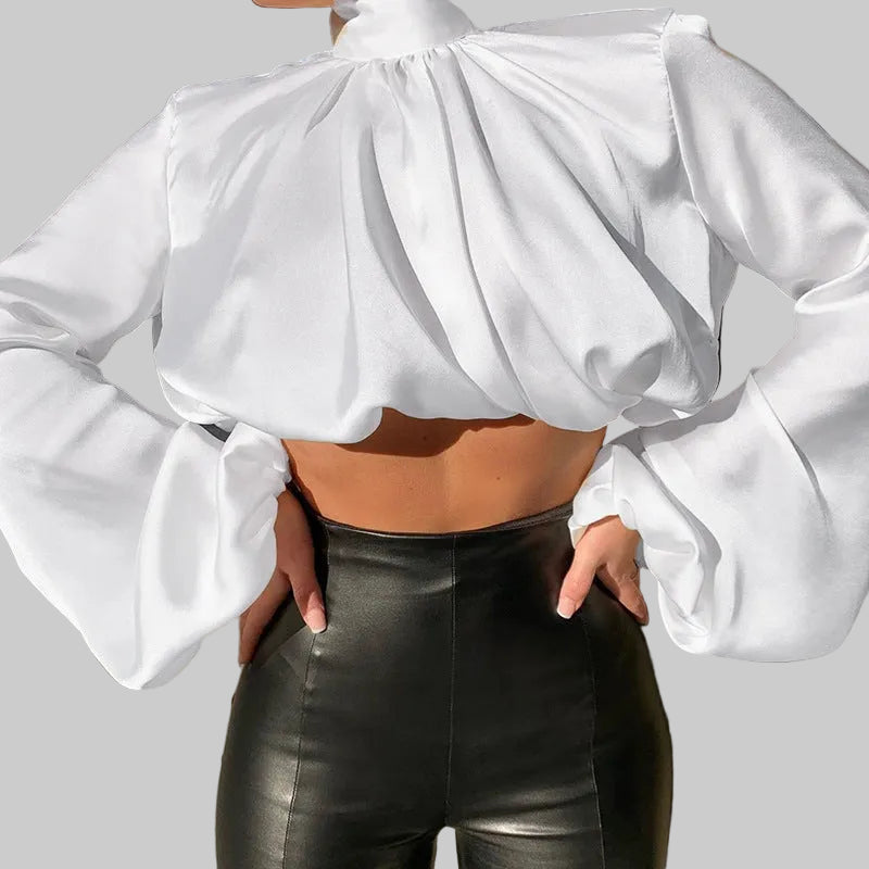 White satin lantern sleeve crop blouse showing gathered mock neckline and oversized puff sleeve detail | The Pretty Pistol