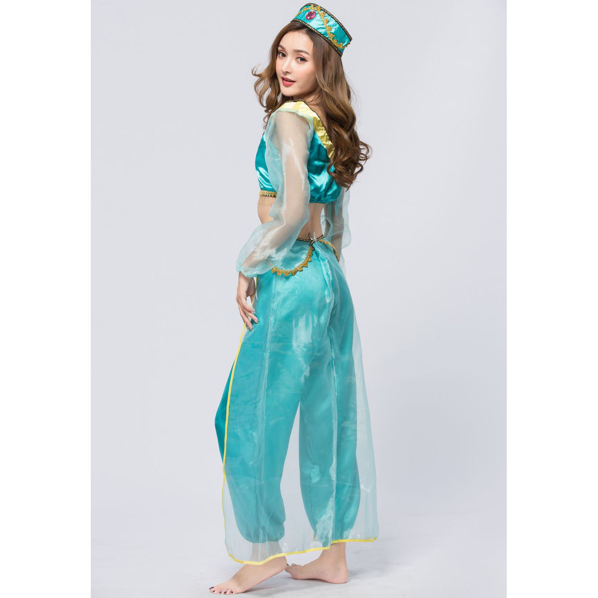 Princess Jasmine costume set in teal satin with off-shoulder crop top, sheer sleeves, gold trim, harem pants, tassel belt, and jeweled headpiece | The Pretty Pistol